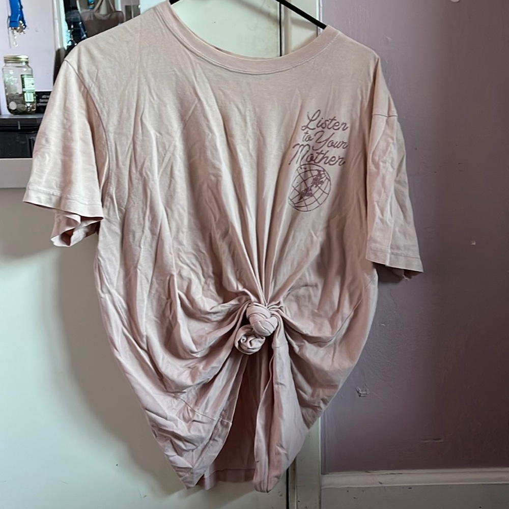 It’s pink and it says “listen to your mother”